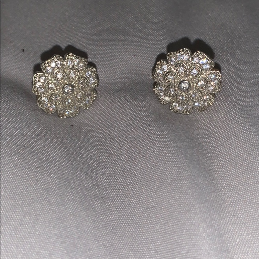 Silver floral studs
